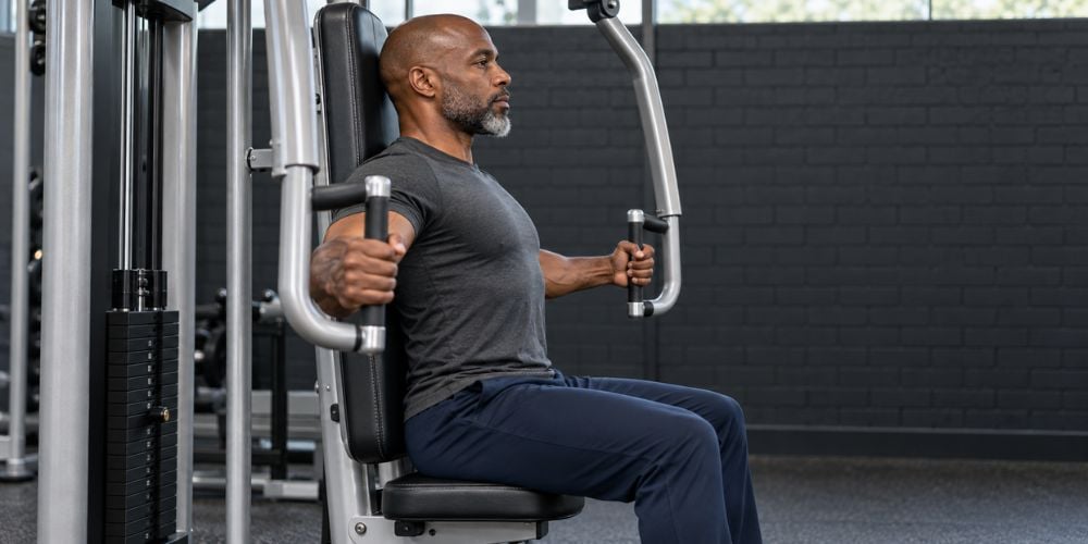 How To Fix Shoulder Rolling On The Pec Deck 3 How To Fix Shoulder Rolling On The Pec Deck 3